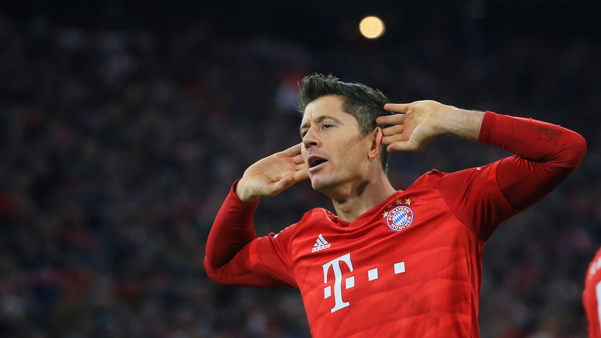 Robert Lewandowski of Bayern Munich celebrates a goal during a Bundesliga match in November, 2019. The German football league is set to make a comeback this weekend.