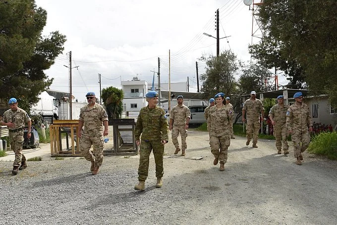 Force Commander Cheryl Pearce w/peacekeepers from Slovakia.
