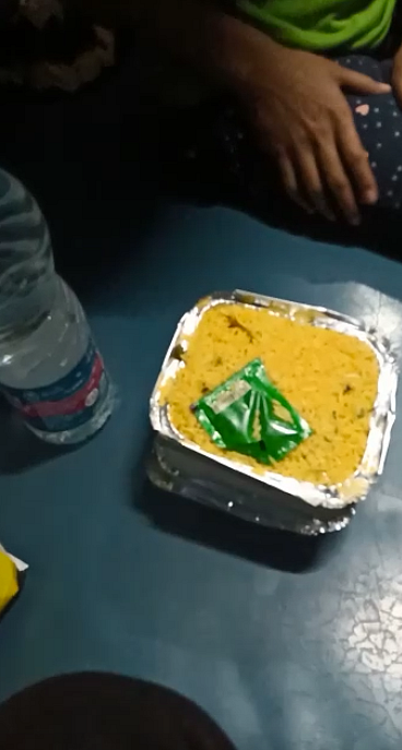 At Kapur station, we have got biryani and a bottle of water.