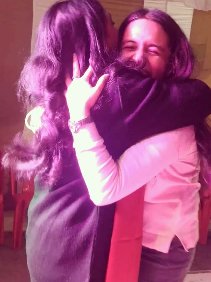 A moment captured after dancing together.