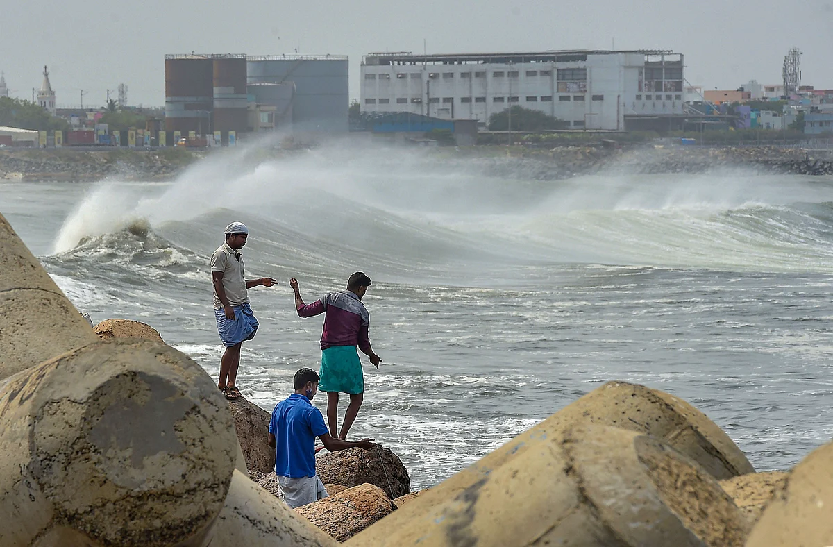 Turbulent waves crash into the coast Kasimedu Fishing Harbour, ahead of landfall by Cyclone Amphan in Chennai, Tuesday. 