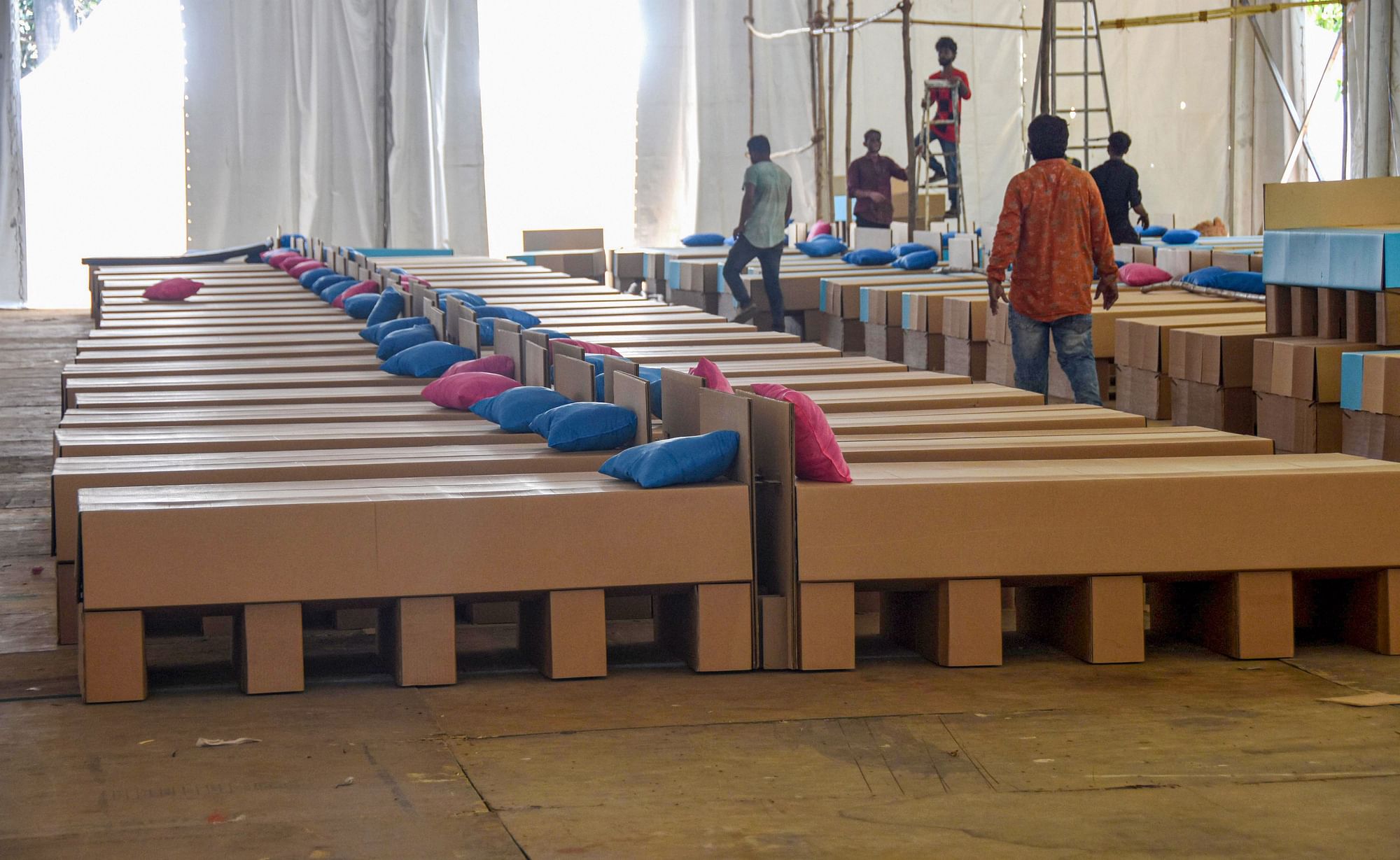 Paper-box beds are seen at an under construction quarantine facility for COVID-19 patients, at Dharavi in Mumbai on 3 May.