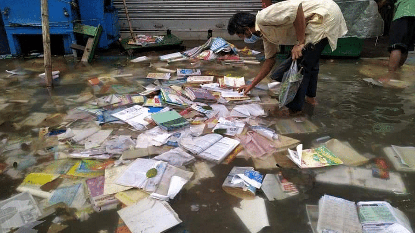 Books floating in the water logged college street in Kolkata after Cyclone Amphan hit Kolkata.