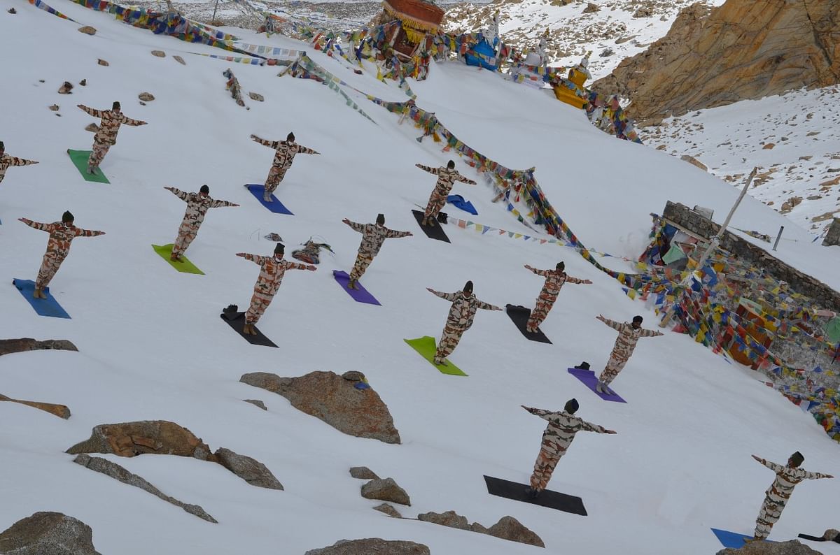 ITBP personnel practised yoga amidst the snow in Leh, Ladakh and Uttarakhand.