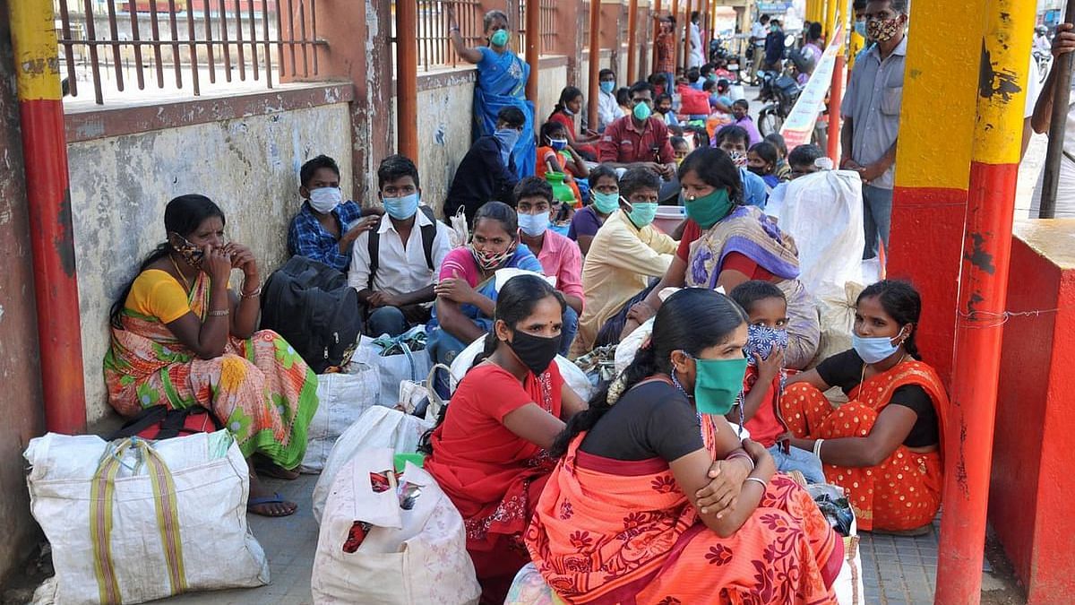 A file photo of migrants sitting in front of KSRTC bus stand in Chikmagalur, Tamil Nadu during the COVID-19 lockdown. Image used for representation.&nbsp;