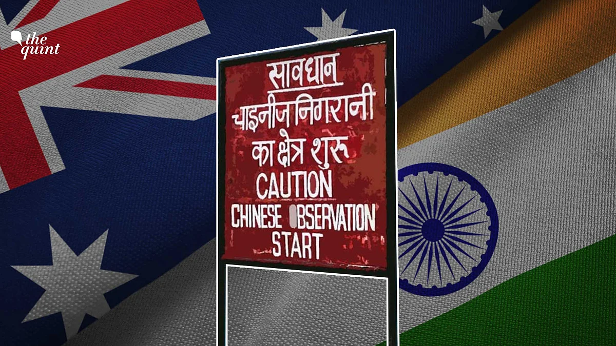 Image of Indian and Australian flags (R & L, respectively), and border signpost used for representational purposes.