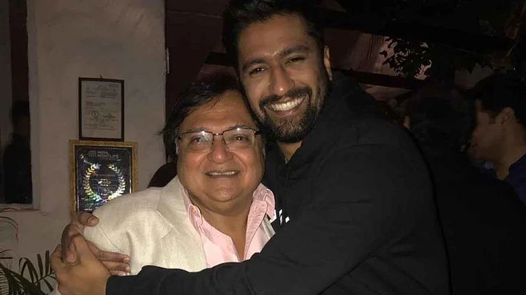 Actor Rakesh Bedi with Vicky Kaushal. 