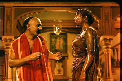 Kanhaiya Lal and Nargis in a scene from Mother India