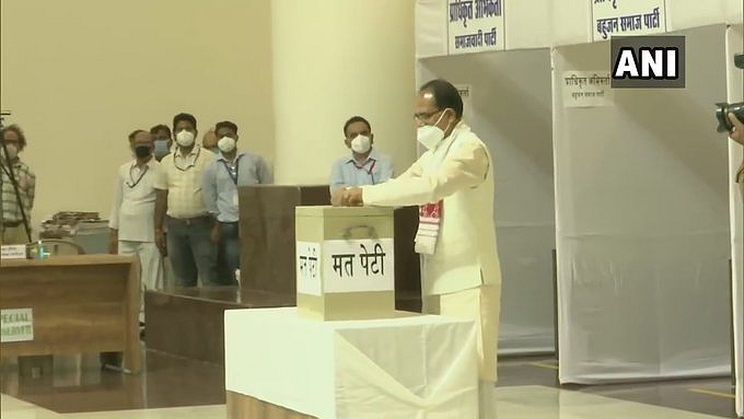 Madhya Pradesh CM Shivraj Singh Chouhan casts his vote for the Rajya Sabha elections. 