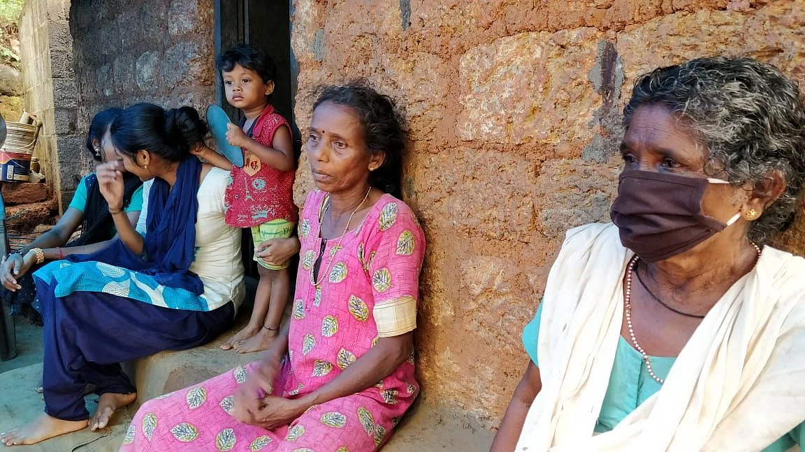 Devika’s mother (dressed in pink) is inconsolable after the death of her daughter.