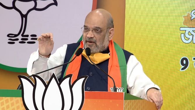 Home Minister Amit Shah addresses a "Jan Samvad" virtual rally for West Bengal from the BJP party headquarters in New Delhi.