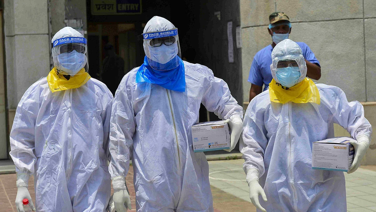 Medics arrive to take samples of suspected COVID-19 patients for lab tests at a government hospital in New Delhi. Image used for representational purpose.