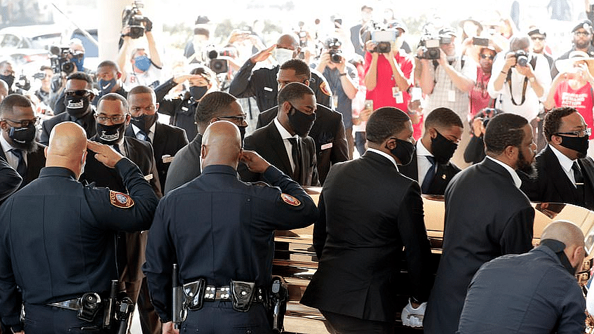 Cops salute George Floyd’s casket at his funeral