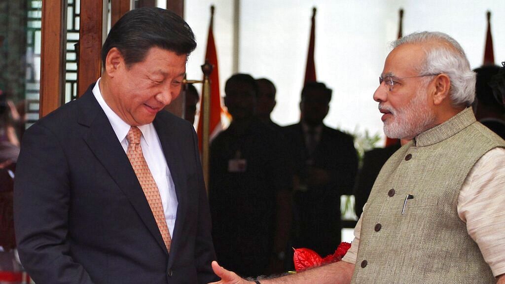 File Photo: PM Narendra Modi (R), welcoming Chinese President Xi Jinping, upon his arrival at a hotel in Ahmedabad.&nbsp;