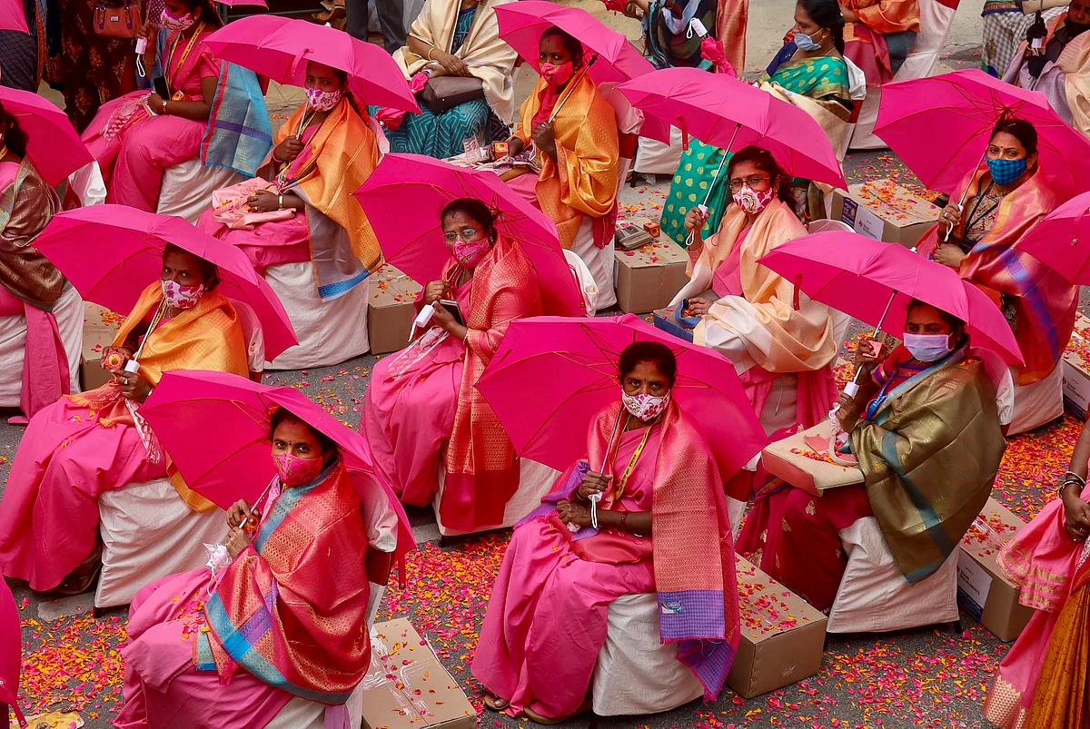 ASHA workers during a felicitation event by BJP party for their contribution in India’s fight against coronavirus, amid the ongoing COVID-19 nationwide lockdown, at Rajajinagar in Bengaluru.