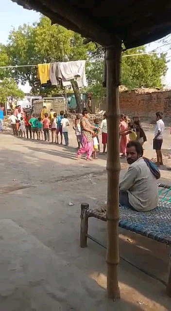 Ration being distributed.