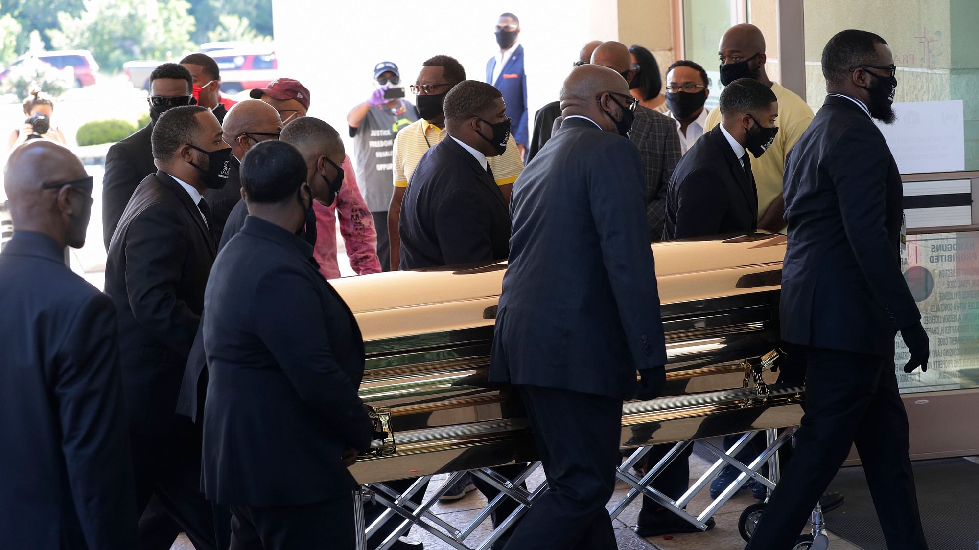 The casket of George Floyd arrived for a public memorial at The Fountain of Praise church in Houston, Monday.