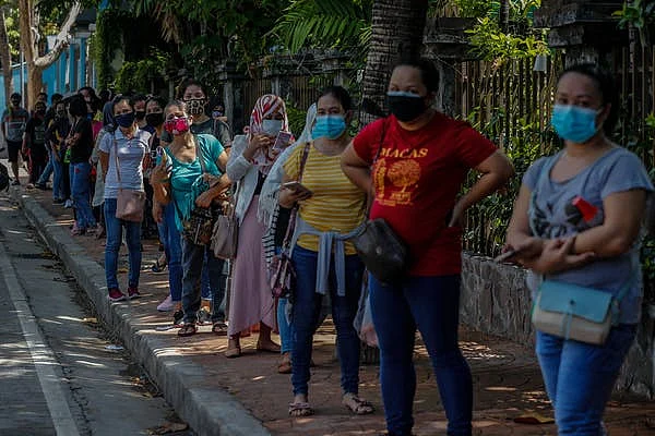 In the Philippines, tests are required for most people before they can return to work