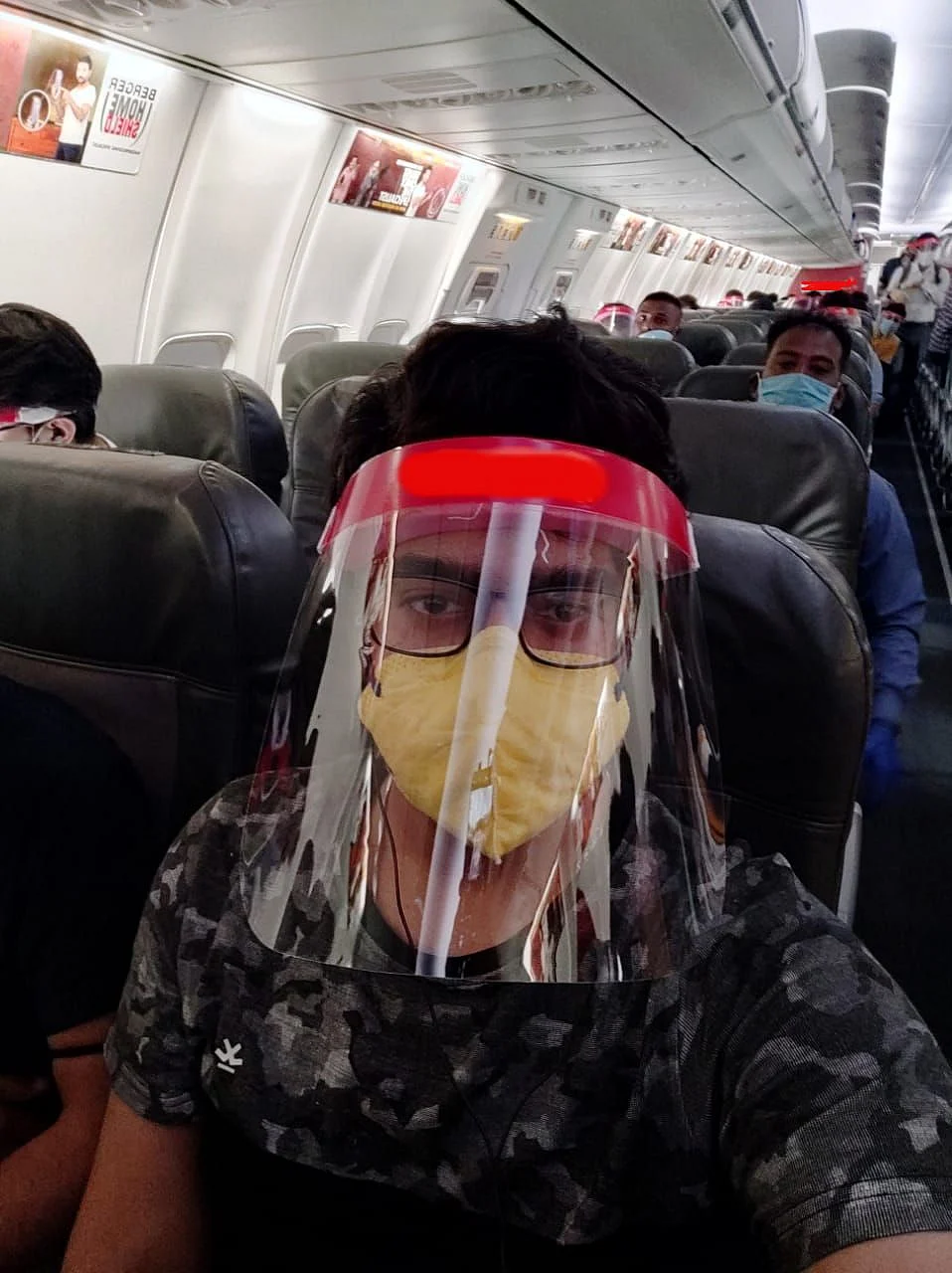 The airline gave us a surgical mask, face shield and a few sanitizer sachets.