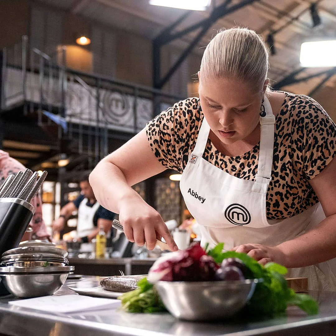 A contestant whipping a dish in one of the seasons of Masterchef Australia.