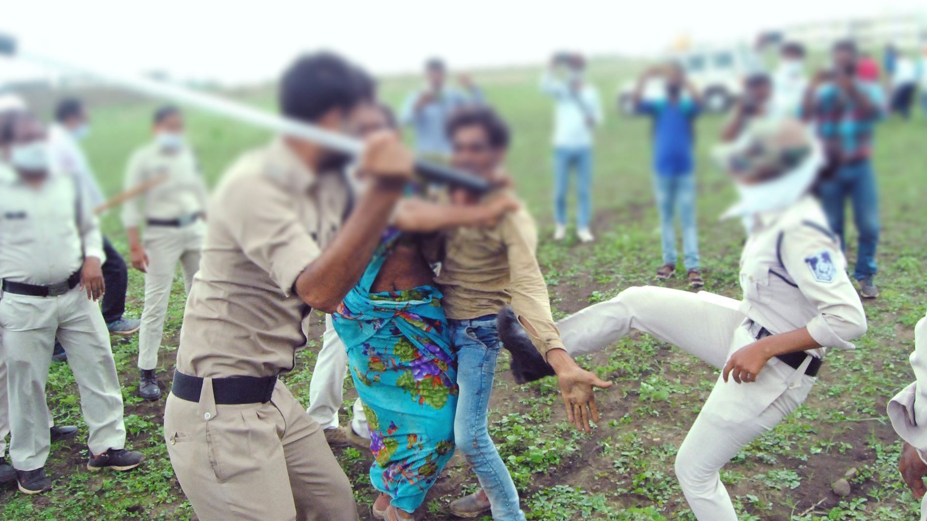Policemen beating up locals in Guna village, after a couple allegedly consumed pesticide during an ‘encroachment removal’ drive.