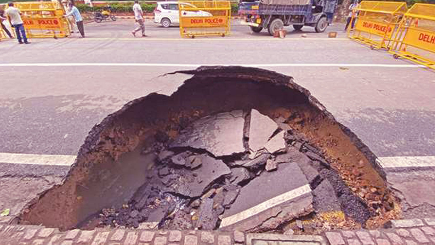 Portion of Ashoka Road in Delhi caved in.