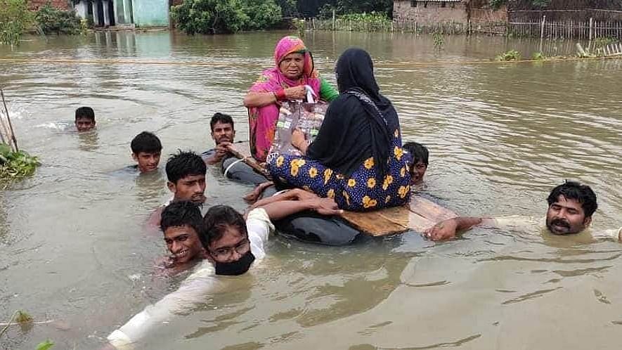 Makeshift boats serve as the only option in some villages, in Bihar’s flood-hit Darbhanga.