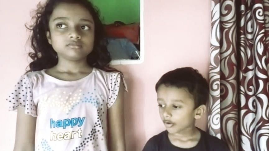 Journalist and Youtuber Safiqul Islam's eight-year-old daughter Arsiya (left) and four-year-old son Arshad (right) and their uncle Mofijul Islam's house.