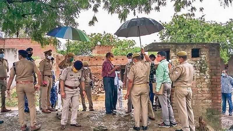 Special Investigation Team in the Bikru village in Kanpur, where eight policemen were killed by gangster Vikas Dubey, on Sunday. 