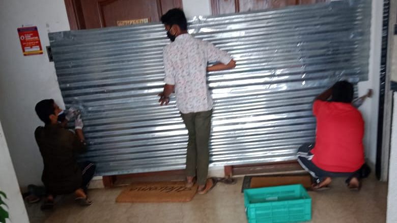 BBMP Officials Seal Apartment Doors with Metal Sheets in Bengaluru