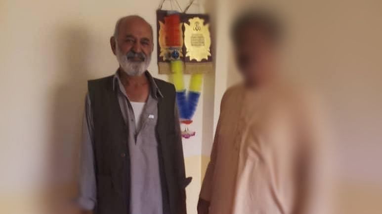 Photo of Nidan Singh with an Afghani security official.&nbsp;