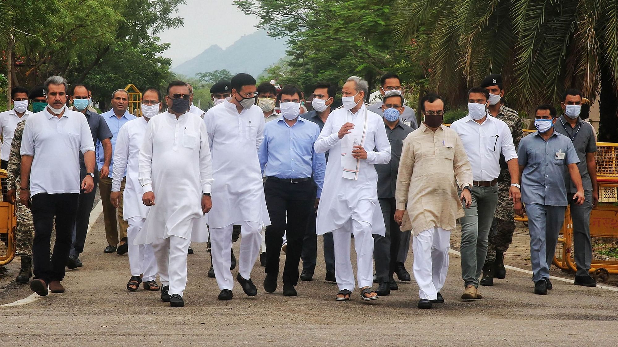 File image: Rajasthan CM Ashok Gehlot along with senior Congress leaders arrive to address media outside a hotel in Jaipur on 24 July. &nbsp;