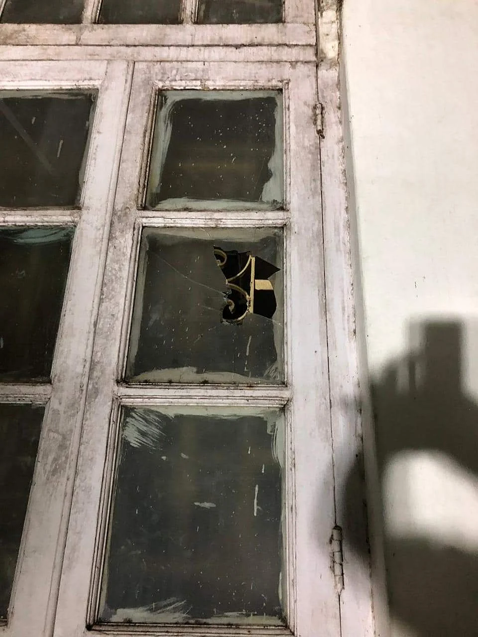 The unidentified men threw stones at two rooms of Rajgruha.