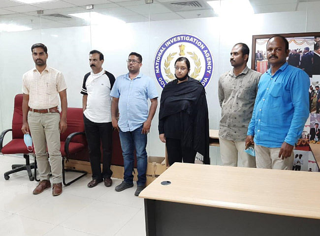 Accused Swapna and Sandeep with NIA officials.