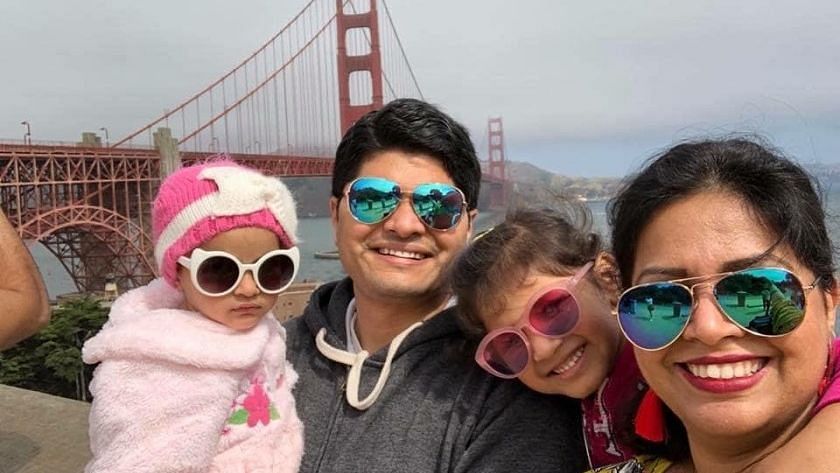 H-1B workers Poorva Dixit and Kaustubh Talathi with their two children, who are both US citizen, in San Francisco.
