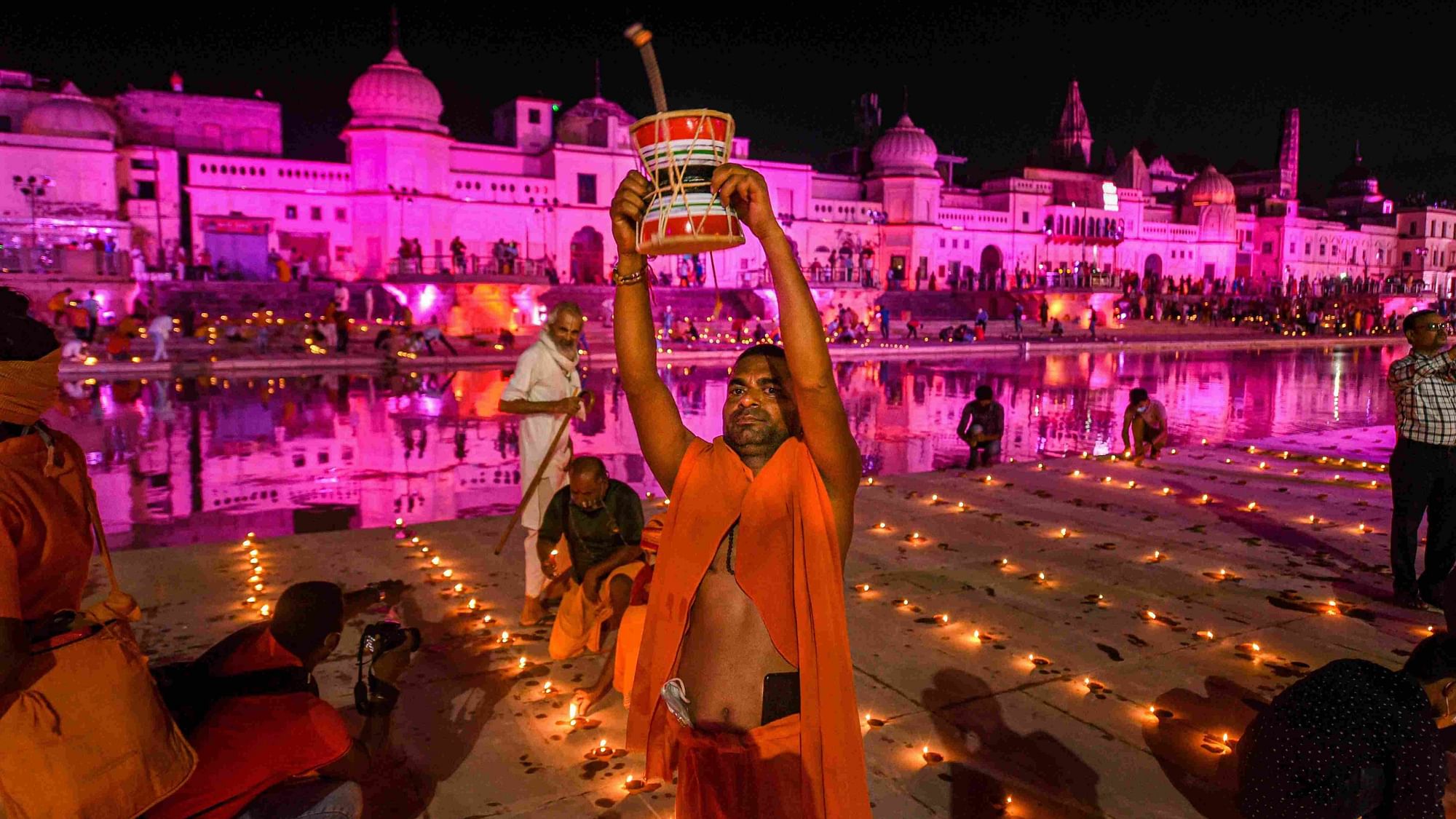 Devotees celebrate ‘Deepotsav’ at Ramghat on the eve of ‘bhoomi pujan’ of the Ram Temple, in Ayodhya on 4 August. &nbsp;