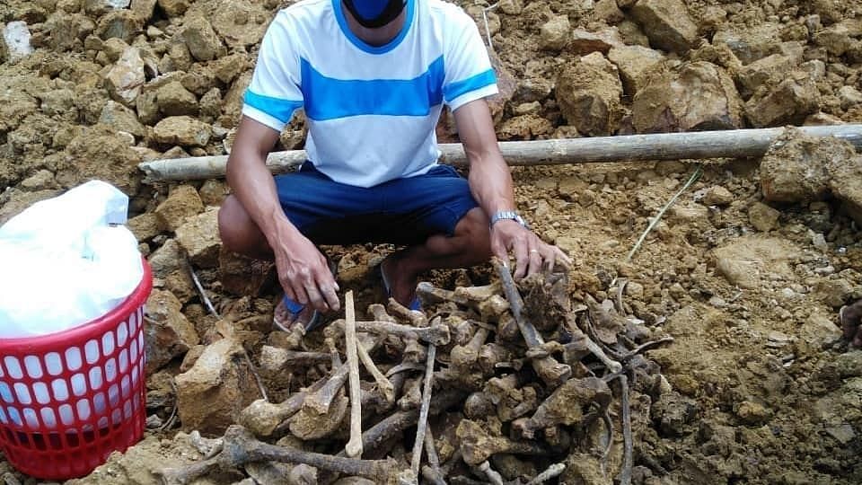 Human skulls and bones, believed to be several decades old, found in western Mizoram's Mamit district.
