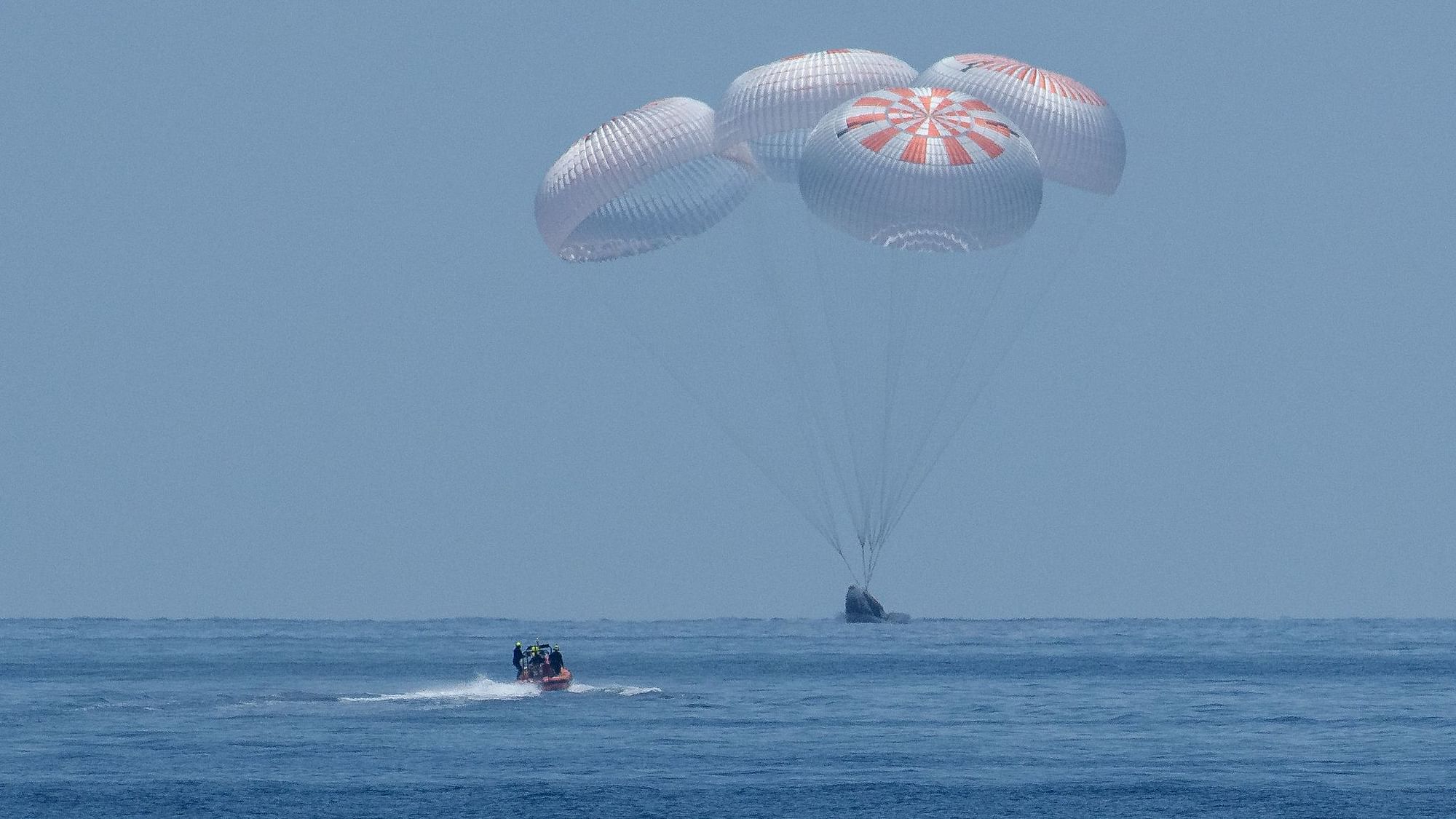 The first American-crewed spaceship to fly to the International Space Station in almost a decade, returned safely back to Earth on Sunday, 2 August.