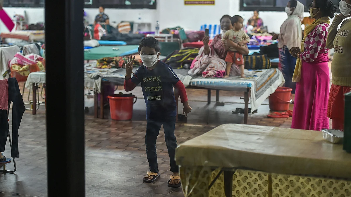 COVID-19 infected child dances inside a ward at the Commonwealth Games (CWG) Village sports complex, temporarily converted into a Covid care centre, in New Delhi, Thursday, 27 August, 2020. 