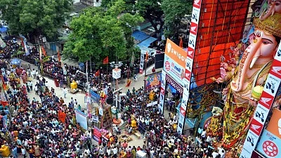 File Image: People offer prayers to Lord Ganesh to a 61-feet high idol of lord Ganesh at at Khairatabad on Ganesh Chaturthi in Hyderabad.
