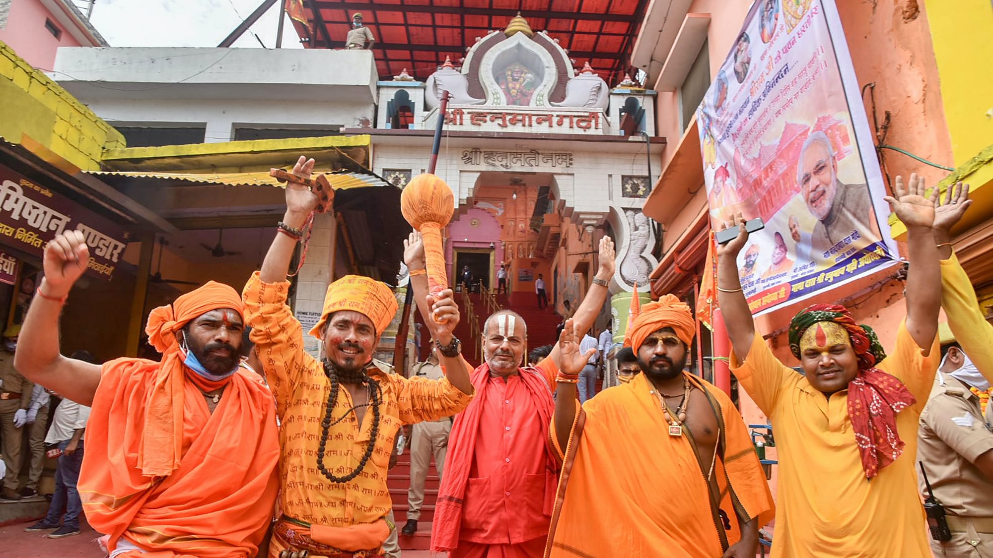 Sadhus celebrate the Bhoomi Pujan day for the construction of Ram Temple, at Hanuman Garhi in Ayodhya, Wednesday, 5 August.