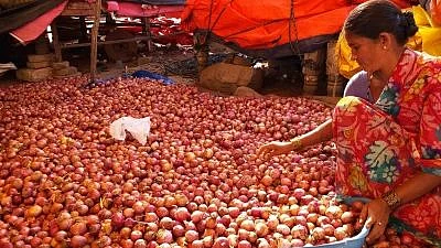Hyderabad: Onion sellers at a wholesale market in Hyderabad on Dec. 7, 2019. 