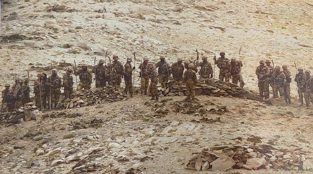 Chinese soldiers seen carrying spears & other sharp edged weapons near Mukhpari hill north of Rezang La after Monday firing incident.