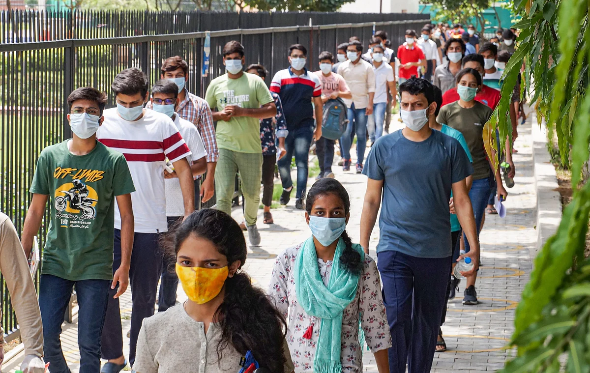 Students leave an examination centre after appearing for the JEE 2020 entrance papers, amid the ongoing coronavirus pandemic, in Gurugram.