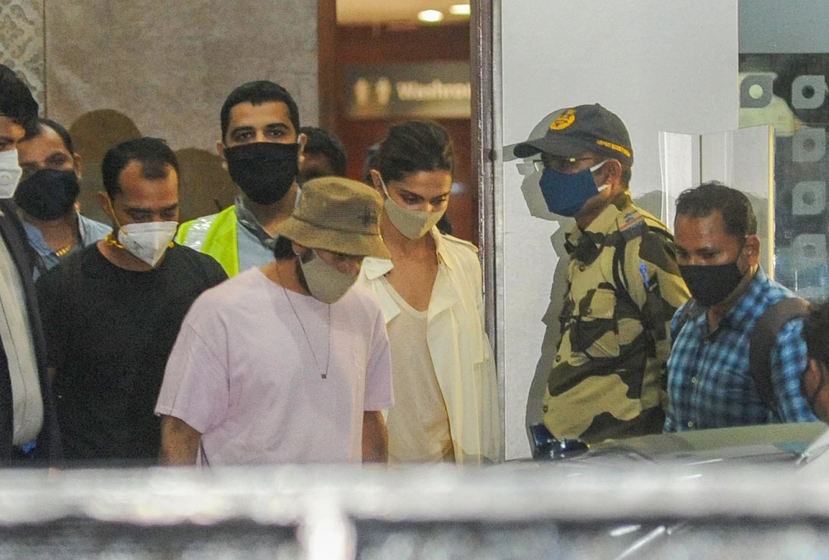 Bollywood actors Deepika Padukone and Ranveer Singh arrive at Mumbai International Airport, after the former was summoned by NCB in a Bollywood drugs probe, in Mumbai, Thursday, 24 September, 2020.