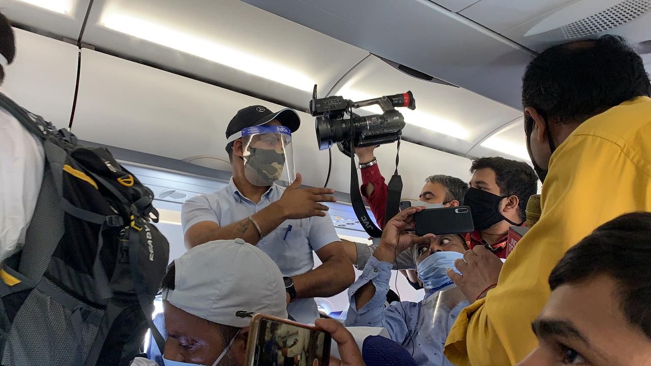 Media when told that filming is strictly prohibited on the flight.