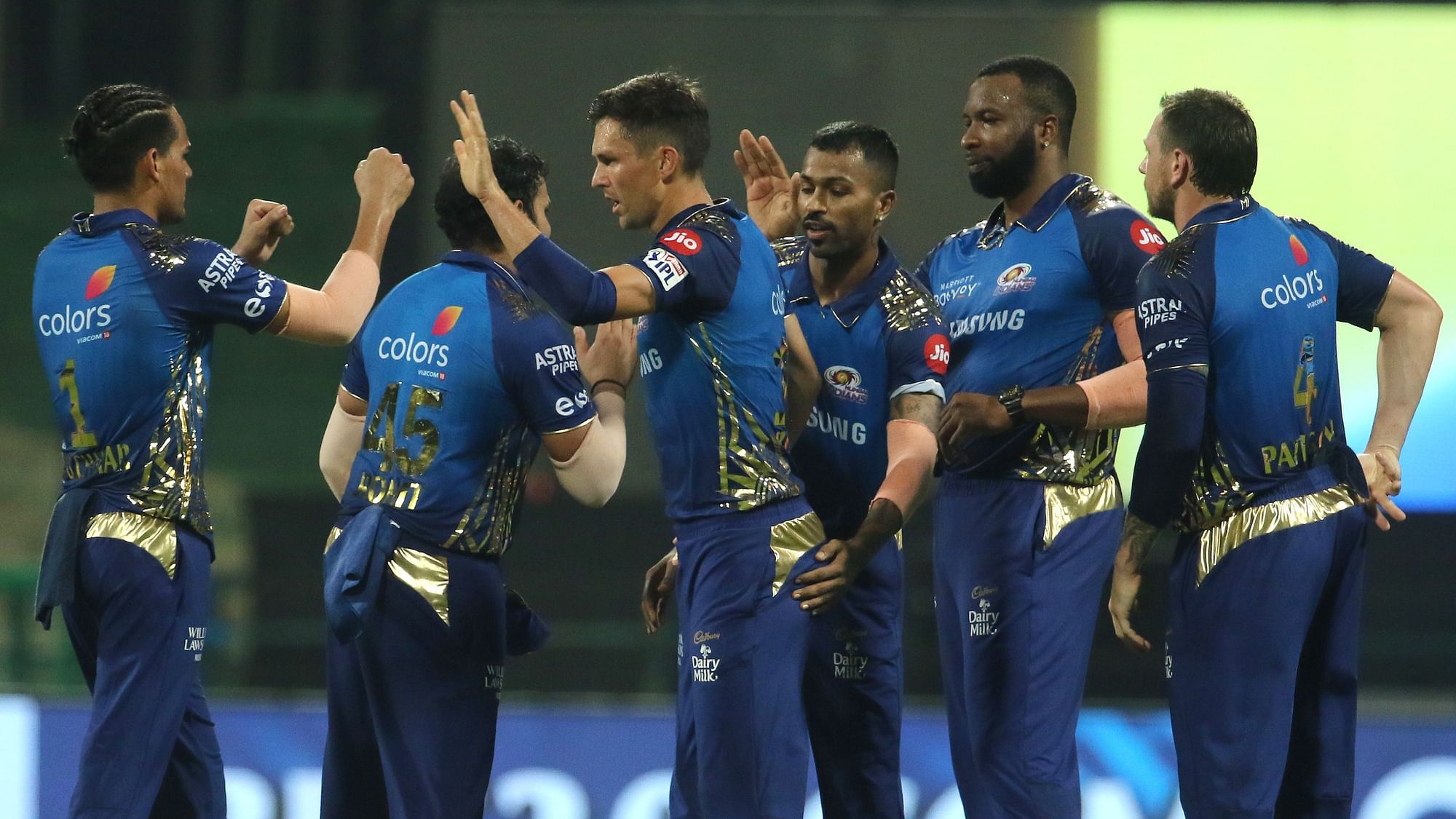 Reigning champions Mumbai Indians strolled to a 49-run win over Kolkata Knight Riders.
