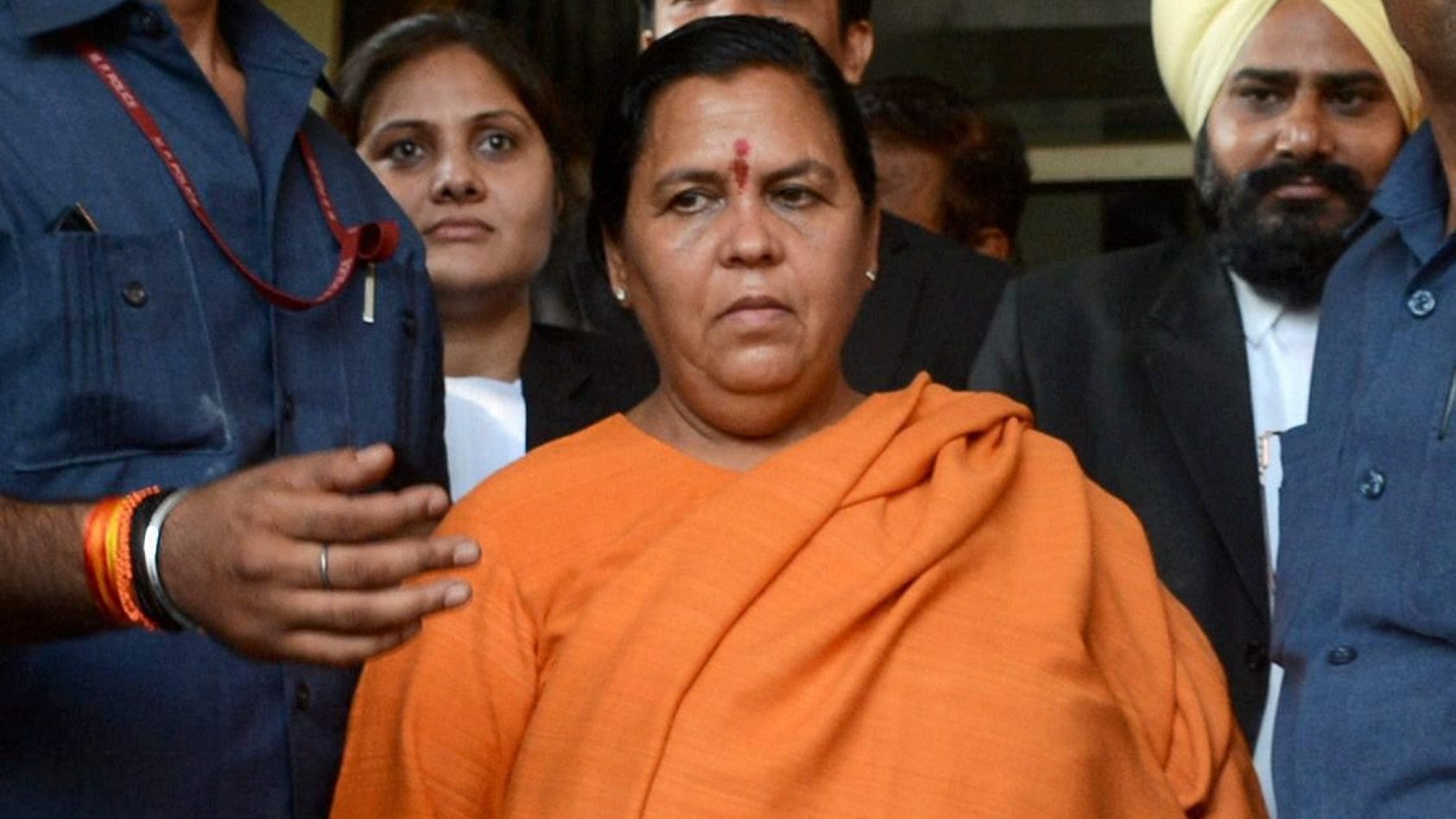 BJP senior leader Uma Bharti, one of the accused in the Babri Masjid demolition case, coming out after appearing before a Special CBI court in Lucknow on Tuesday.