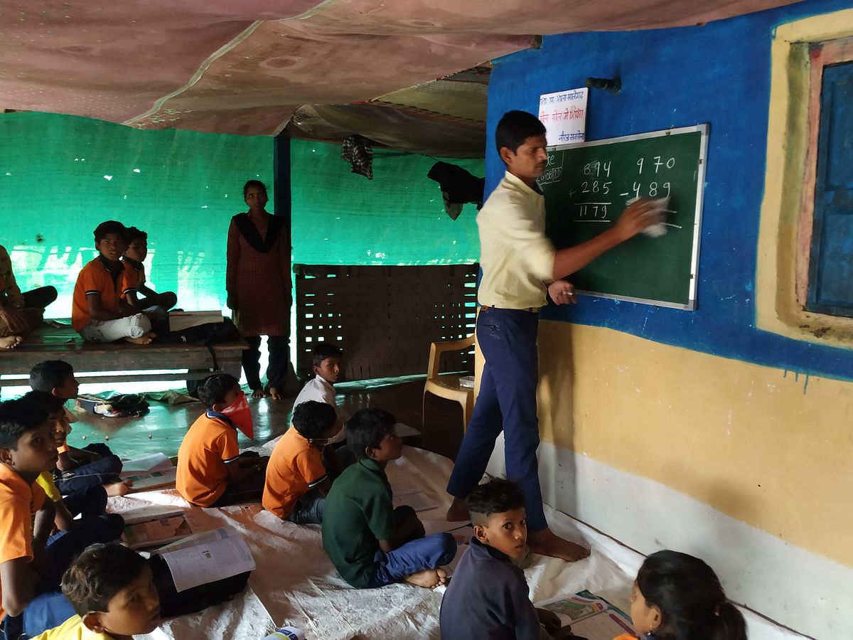 Neeraj Saxena, an assistant school teacher, teaches more than 100 tribal students in Raisen district of MP.