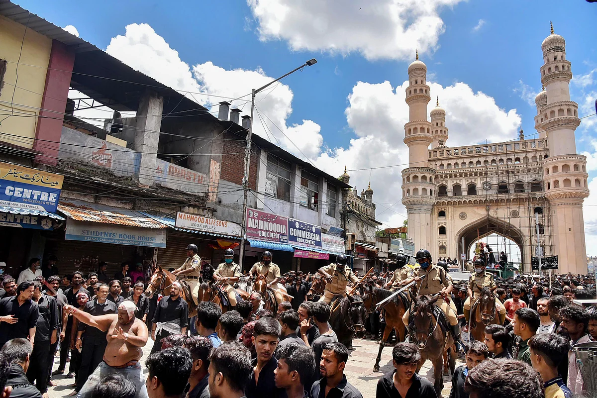 Shia Muslims take part in a procession during Muharram, at Charminar in Hyderabad, on 30 August 2020.